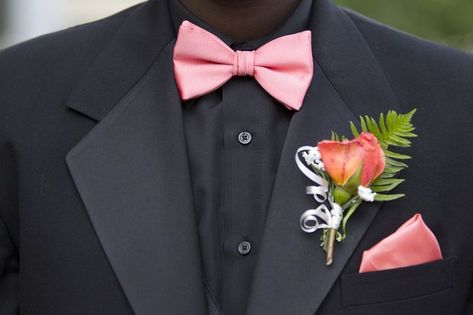 Black Tux Pink Bow Tie, Black Suit With Pink Bow Tie, Black Tuxedo With Pink Bow Tie, Black Tux With Pink Accents, Black Tux With Pink Bow Tie, All Black Suit With Pink Bow Tie, Black Suit Pink Tie Prom, Pink Chambelan Suits, All Black Suit With Pink Tie