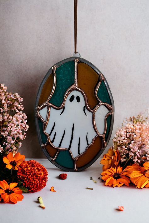 Stained glass ghost, with a 70s themed background, halloween 2023 Halloween Stained Glass Patterns, Spooky Stained Glass Art, Stained Glass Fall Suncatchers, Stained Glass Ghost, Spooky Lantern, Ghost Stained Glass Art, Stained Glass Cobweb, Stained Glass Halloween Suncatchers, Stained Glass Halloween