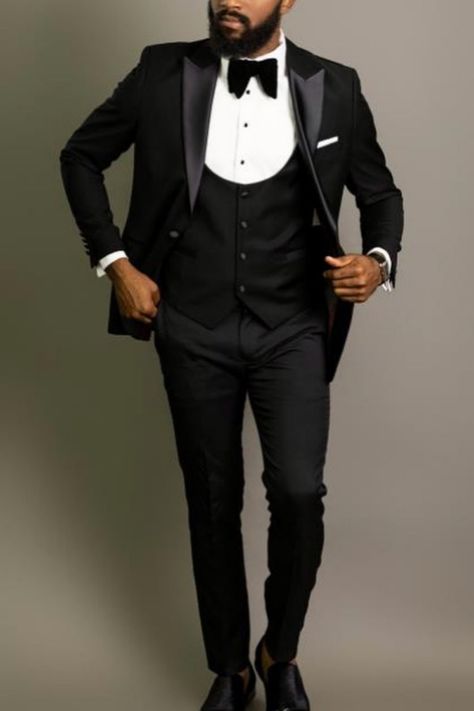 Man wearing a black tuxedo outfit. Three Piece Tuxedo Wedding Black, Three Piece Tuxedo Wedding, Black Three Piece Suit Men, Tuxedo Designs, Three Piece Tuxedo, Black Three Piece Suit, Designer Tuxedo, Black Tuxedo Jacket, Male Outfit