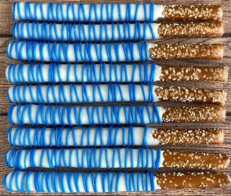 Sweet and Salty deliciousness! Custom dipped pretzel rods are made with the most highest quality of ingredients and plenty of love! You will get 1 dozen pretzels decorated as shown in photo.   These are made to order so processing time is 1-2 weeks, NOT including shipping time.  Supplies are very limited so what you see in photos and inspirations will NOT be exact but I will replicate to the best of my ability. Royal Blue Pretzel Rods, Colorful Pretzel Rods, Blue Dipped Pretzel Rods, Royal Blue Chocolate Covered Pretzels, Blue Chocolate Covered Pretzels, Tornado Party, Dipped Pretzel Rods, Football Treats, Red Chocolate