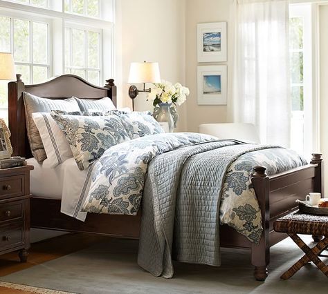 ON SALE! Pottery Barn's Cortona Bed. The bold proportions and rich detail of Spanish Revival furniture are echoed in our Cortona Collection, giving each piece the presence of an heirloom. The bed makes a handsome bedroom centerpiece with its baluster-style posts, bun feet, and planked headboard and footboard.  Affiliate link Pottery Barn Bedroom Master, Pottery Barn Bedroom, Barn Bedroom, Pottery Barn Bedrooms, Barn Bedrooms, Pottery Barn Furniture, Pottery Barn Bedding, Blue Bedroom, Master Bedrooms Decor