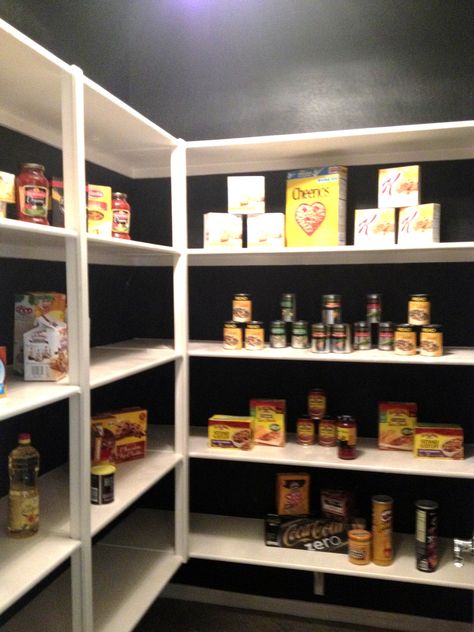 I'm painting the inside of my pantry black, or any other color!  This is so cool!  Add a classy chandelier and it makes your pantry fancy :) Pantry With Black Walls, Black Pantry Walls, Painting Pantry Interior, Pantry Black Shelves, Black Pantry Shelves, Paint Pantry Interior, Painted Pantry Interior, Painting Pantry, Black Beadboard