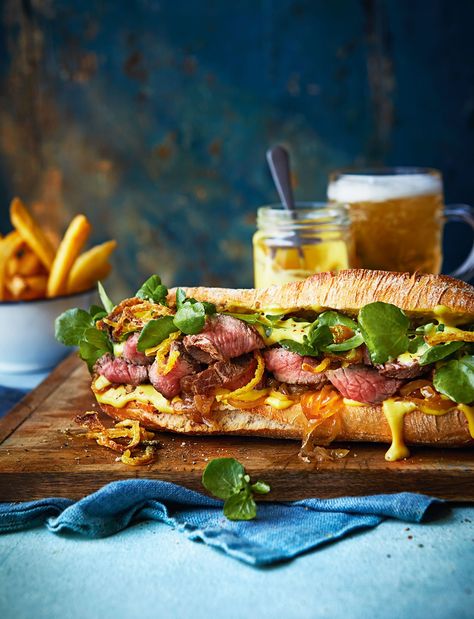 A bumper steak sandwich, laced with punchy mustard mayo, with sticky and crispy beer onions for ultimate indulgence Wimbledon Recipes, Sainsburys Recipes, 5 Ingredient Recipes, Dinner Party Menu, Steak Sandwich, Burgers Sandwiches, Food Garnishes, Onion Recipes, Beer Recipes