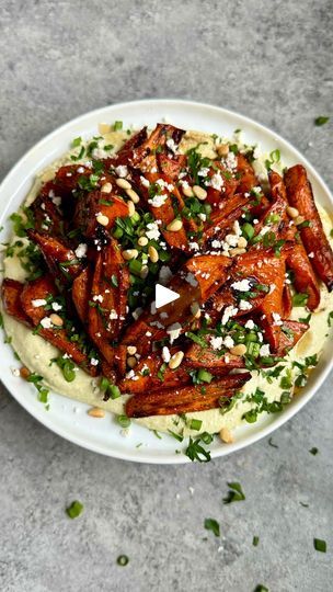 281K views · 915 reactions | CUMIN-HONEY CARROTS WITH ROASTED JALAPEÑO WHIPPED RICOTTA & FETA! This dip is freaking incredible 😍 • • For the carrots: 1 1/2 lbs carrots, trimmed/halved and sliced into thirds  2 tbsp olive oil  1 tsp cumin 3/4 tsp salt  1/2 tsp onion powder  1/2 tsp paprika Honey  • For the dip: 2 jalapeño peppers, trimmed/halved and seeded Olive oil  3/4 cup ricotta 2 oz feta Juice of 1/2 lime 1/4 tsp salt Pepper to taste  • For optional toppings: Chopped scallions  Chopped fresh cilantro  Feta Toasted pine nuts • 1️⃣Preheat the oven to 425. Line a sheet pan with parchment paper and set aside.  2️⃣Add the carrots to the sheet pan, then drizzle with the oil and season with the cumin, salt, onion powder and paprika. Toss to coat, then roast for 20 minutes, cut-side down.3️⃣P Honey Carrots, Jalapeño Peppers, Glazed Sweet Potatoes, Whipped Ricotta, Roasted Jalapeno, Honey Garlic Sauce, Vegetables Recipes, Orange Salad, Toasted Pine Nuts