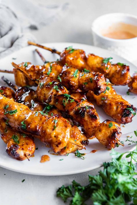 Skewered chunks of chicken are slathered with sweet and tangy bang bang sauce and cooked until tender and caramelized. These Bang Bang Chicken Skewers can be served as an entrée or pile them on a platter for a fun party snack. Sweet Chili Chicken Skewers, Bang Bang Shrimp Skewers, Grilled Bang Bang Chicken, Bang Bang Chicken Skewers, Grilling Chicken, Bang Bang Sauce, Sweet Chilli Chicken, Sweet Chili Chicken, Bang Bang Chicken