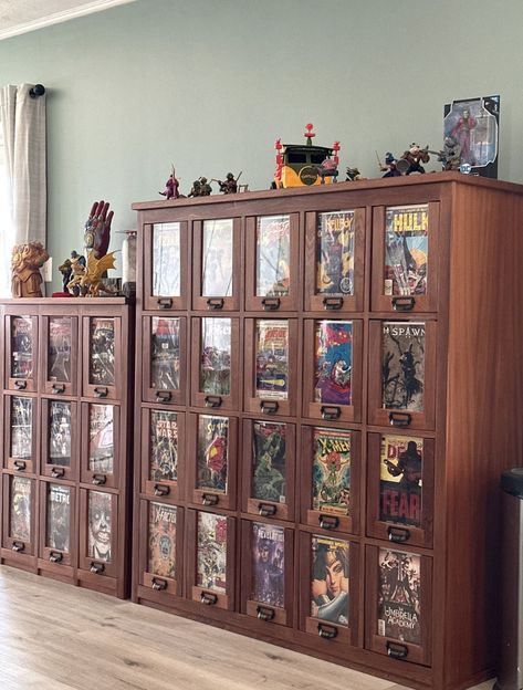 Comic book storage and organization cabinets. Solid mahogany custom cabinets. Comic Book Drawer, Comic Book Cabinet Storage, Comic Book Cabinet, Comic Book Organization Ideas, Board Game Shelving, Comic Book Shelves, Comic Collection Display, Comic Book Display Ideas, Box Shelf Ideas