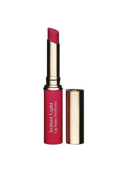 Pat a finger over this sheer red lipstick and tap it on your lips for a hint of superflattering, God-you-look-great color. Sheer Red Lipstick, Clarins Lipstick, Minimalist Makeup Bag, Clarins Makeup, Lip Treatments, Shiny Lipstick, Glossier Lipstick, Minimalist Makeup, Moisturizing Lipstick