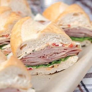 10 Great Sandwiches for a Crowd Sub Sandwich, Picnic Sandwiches, Slider Sandwiches, Summer Sandwiches, Croissant Sandwich, Paula Deen Recipes, Deli Sandwiches, Bagel Sandwich, Ham Sandwiches