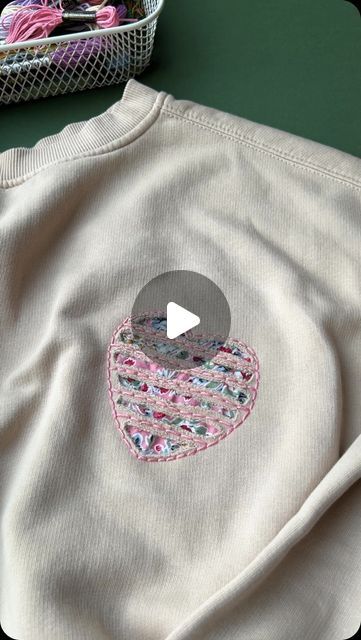 Jenny ~ Embroidery Art, Design & Crafts on Instagram: "Do you like this technique? It’s called reverse appliqué. I love a bit of texture 🩷
.
.
#sustainableclothing 
#handmadestyle 
#embroideryinstaguild 
#dmcembroidery 
#sewing 
#embroideryart 
#embroideryhoop 
#embroidered 
#embroideryartist 
#embroideryartwork 
#patchwork 
#reverseapplique 
#britishstitchers 
#embroiderywork 
#upcycledfashion 
#applique 
#handmadewithlove 
#embroideryhoopart 
#embroidelicious 
#florals
#modernembroidery 
#contemporaryembroidery 
#bordado 
#broderiemoderne 
#broderiemain 
#embroidery 
#handmadeembroidery 
#createdtocreate 
#handmadeisbetter 
#craftsposure" Reverse Embroidery Sweatshirt, Reverse Applique Sweatshirt Diy, Reverse Embroidery, Applique Designs Free, Reverse Applique Designs, Embroidery Hoop Art Diy, Applique Stitches, Clothes Embroidery Diy, Clothes Embroidery