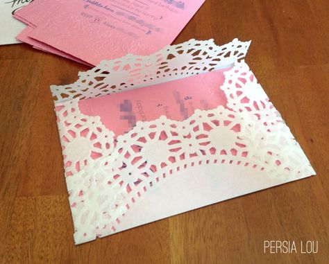 DIY Lacy Paper Doily Envelopes by Persia Lou Paper Dollies Decorations, Paper Doily Crafts Wedding, Paper Doilies Wedding Place Setting, Doily Invitations Diy, Tea Party Invitations Diy, Paper Dollies Table Setting, Tea Party Baby Shower Invitations, Tea Paper, Valentines Tea Party