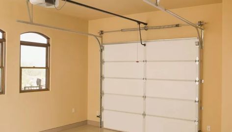 How to Temporarily Convert a Garage to a Guest Bedroom Painted Garage Walls, Garage Redo, Garage To Living Space, Overhead Garage Door, Garage Room, Converted Garage, Garage Bedroom, Painted Concrete Floors, Garage Renovation