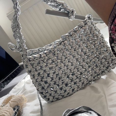 Crocheted shoulder bag from silver metallic yarn that resembles t shirt yarn Silver Crochet Bag, Crochet Silver, Silver Bag, Hobby Gifts, Crochet Shoulder Bag, Silver Bags, Kawaii Crochet, Metallic Yarn, T Shirt Yarn