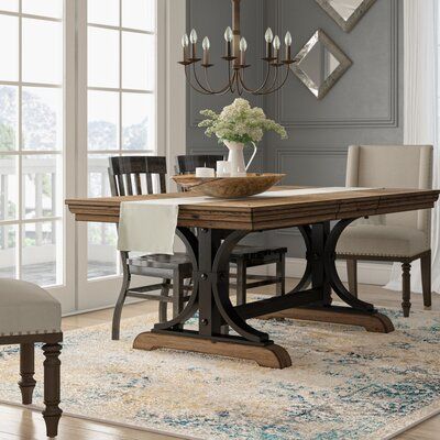 This Nailhead Extendable Dining Table brings a rustic-yet-refined charm to all your meals. The rubberwood construction will not expand and contract with varying temperatures and provides superior strength and durability. The curved sturdy base gives the table strong support and made it a long-lasting piece. Driftwood-finished accents and nailhead trim add a rustic touch and the table comes complete with an 18" wide extension leaf which makes room for 8 people. | One Allium Way® Alena Nailhead Ex Extendable Dining Table Wood, Transitional Dining Room, Farmhouse Dining Room Table, Dining Table Wood, Modern Farmhouse Dining, Small Kitchens, Trestle Dining Tables, Farmhouse Dining Table, Dining Room Inspiration