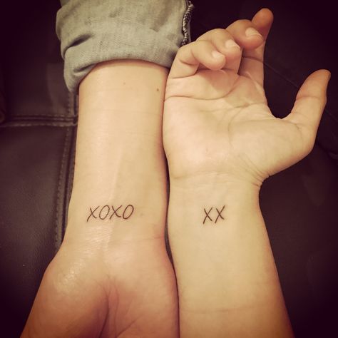 xoxo and xx wrist tattoos Xoxo Tattoo, Couple Wrist Tattoos, Grandma Tattoo, Grandma Tattoos, Wrist Tattoos For Women, Wrist Tattoo, Chest Tattoo, Couple Tattoos, Wrist Tattoos