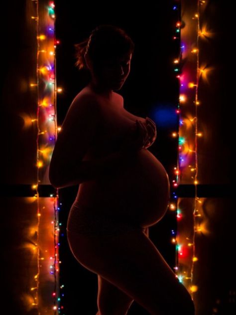 Christmas Light Maternity Pictures, Maternity Boudiour Photoshoot Christmas, Maternity Photography February, Christmas Maternity Shoot, Christmas Maternity Pictures, Maternity Christmas Pictures, Winter Pregnancy Photoshoot, Christmas Pregnancy Photos, Winter Maternity Pictures