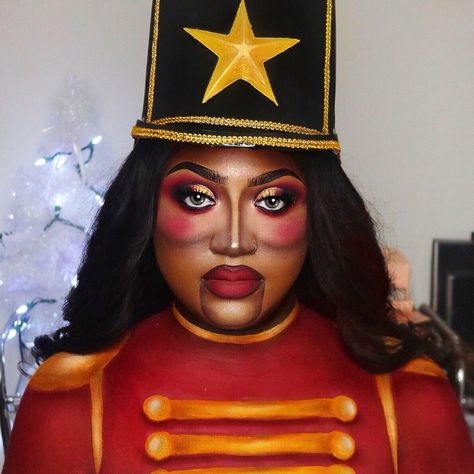 Nut Cracker Makeup, Nutcracker Makeup Ideas, Christmas Creative Makeup, Christmas Photoshoot Black Women, Creative Christmas Makeup Looks, Nutcracker Makeup, Creative Christmas Makeup, Makeup Black Woman, Black Nutcracker