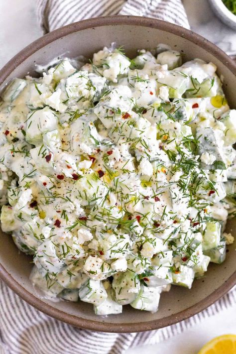 Fresh cucumber yogurt salad is a delicious and easy spin on tzatziki sauce. Made with cucumbers, greek yogurt, feta, fresh dill, & lemon juice Tzatziki Cucumber Salad, Cucumber Yogurt Salad, Healthy Cucumber Salad, Cucumber Feta Salad, Yogurt Salad, Cucumber Dill Salad, Chicken Caesar Pasta Salad, Cucumber Yogurt, Fresh Cucumber