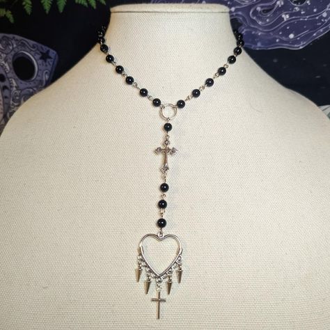 Rosary Style Choker Necklace. Has Cross Charm & Spiked Heart Pendant. Made With Black Glass Beads, Measures 14 Inches Around & Finished With Chain In The Back. Has A Lobster Clasp And 1.5 Inch Extension Chain. #Rosary #Choker #Cross #Goth #Grunge Rosary Choker, Grunge Jewellery, Rosary Ideas, Chain Rosary, Rosary Jewelry, Broom Closet, Goth Necklace, Pearl Rosary, Holiday List