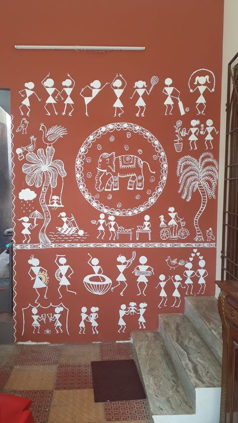 Warli wall painting, makeover of huge car parking wall, warli art, tribal art, diy wall art Mural Wall Art Indian Mural Wall Art, Varali Painting On Wall, Varli Art Rangoli, Traditional Wall Painting Indian, Warli Art On Wall, Warli Paintings On Wall, Worli Painting On Wall, Varli Painting Art On Wall, Warli Art Paintings On Wall