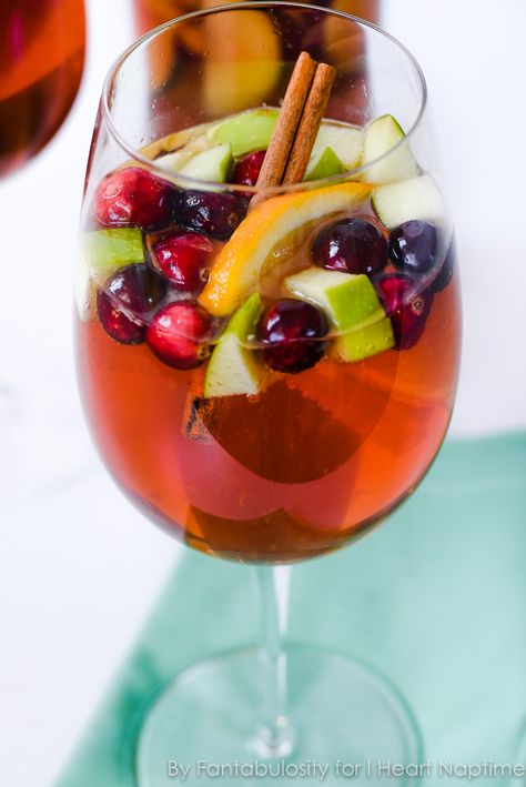 Holiday Sangria Mocktail- the perfect drink for any holiday party! Sangria Mocktail, Holiday Sangria Recipes, Nonalcoholic Party Drinks, Chopped Fruit, Best Non Alcoholic Drinks, Sparkling Grape Juice, Festive Holiday Cocktails, Holiday Sangria, Christmas Sangria