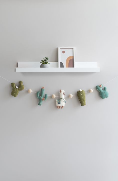 This felt llama cactus garland will be a beautiful desert wall decor in the baby’s nursery, party decoration, baby shower decor, kids room decor, etc. Sewn Garland, Cactus Garland, Desert Wall Decor, Felt Llama, Personalized Nursery Wall Decor, Hanging Cactus, Cactus Nursery, Elegant Nursery, Diy Nursery Decor