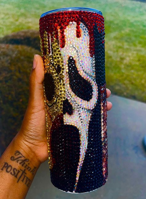 "THIS IS A \"Ready To Ship\" Product! 20oz Skinny Tumbler Tumbler will be as shown. Submit a custom order request at dannixoxo.creations@gmail.com 🌸Shipping Policy 🌸All items are custom made. Please allow 7-21 business days for processing of your order. 🌸\"Ready To Ship\" items ship within 1-3 business days. 🌸Some bulk orders or special orders could take longer. You will be advised if this is the case. 🌸All orders are shipped via USPS priority Mail. 🌸Please ensure your shipping address is CORRECT. 🌸If orders are returned due to incorrect shipping information, you will be required to pay a Re-Ship Fee. 🌸We are not responsible for lost packages due to incorrect shipping information or Post Office Errors.🌸" Ghostface Tumbler, Bedazzled Liquor Bottles, Starbucks Tumbler Cup, Starbucks Cup Art, Rhinestone Cups, Rhinestone Crafts, Scary Decorations, Custom Starbucks Cup, Rhinestone Projects