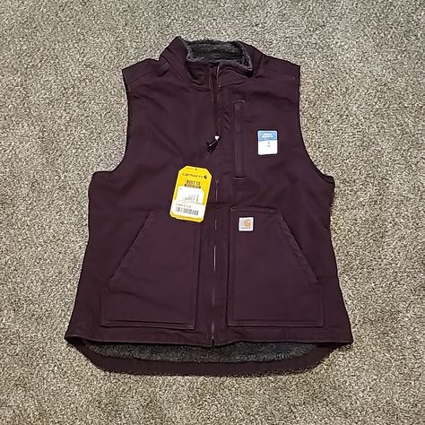 This Women's Vest Is A Versatile Layer Built To Pack On Extra Warmth Right Where It Matters Most. It's Made Of Our Signature Heavyweight Cotton Duck, And Has A Warm Sherpa Lining To Take On Chilly Weather. 12-Ounce, 100% Cotton Sandstone Duck Sherpa Lining Zipper-Secured Chest Map Pocket, Two Lower-Front Pockets And Two Interior Pockets Drop-Tail Adds Coverage Triple-Stitched Main Seams Back Length: 25 Inches Carhart Vest Womens, Carhartt Jackets, Carhartt Women, Chilly Weather, Sherpa Lined, Women's Vest, Womens Vest, Mock Neck, Jackets & Coats