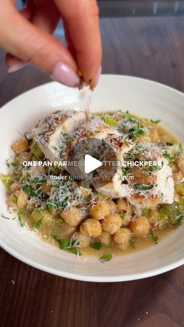 Emily English on Instagram: "Parmesan butter chickpeas with crispy chicken   Introducing a summery dinner idea that’s not only quick but also all done in one pan, making your clean-up a breeze. These chickpeas are addictive and taste even better the next day. A few ingredients to taste like something you could order in a restaurant. Swap the chicken for any protein you like!   You will need to serve 2 556kcal & 52g protein   2 skin-on chicken breasts  1 tin chickpeas, drained (I use bold bean co queen chickpeas) 1 leek  2 cloves minced garlic  1/2 tsp fresh chopped red chilli  50g grated parmesan and the rind 15g butter  1 chicken stock cube  1 lemon   Preheat the oven to 190c fan.   In a deep pan, brown off the chicken breasts skin side down for 3-4 minutes until golden and lovely. Remove Hard Recipes, Butter Chickpeas, Parmesan Butter, Comforting Food, Emily English, Week Meals, Deep Pan, 75 Hard, Chickpea Recipes