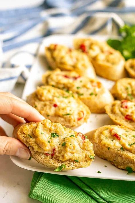 Crab melts are an easy but sophisticated appetizer with a creamy, cheesy crab mixture that’s baked onto slices of French bread. Everyone will go crazy for these! Crab French Bread, Cracked Crab Cheese Bread, Crab Bread Cheesy, French Bread Appetizers Simple, Crab Bites Appetizers, French Baguette Recipe Appetizers, Crab Bread Recipe, Crab Bites Recipe, French Bread Appetizers