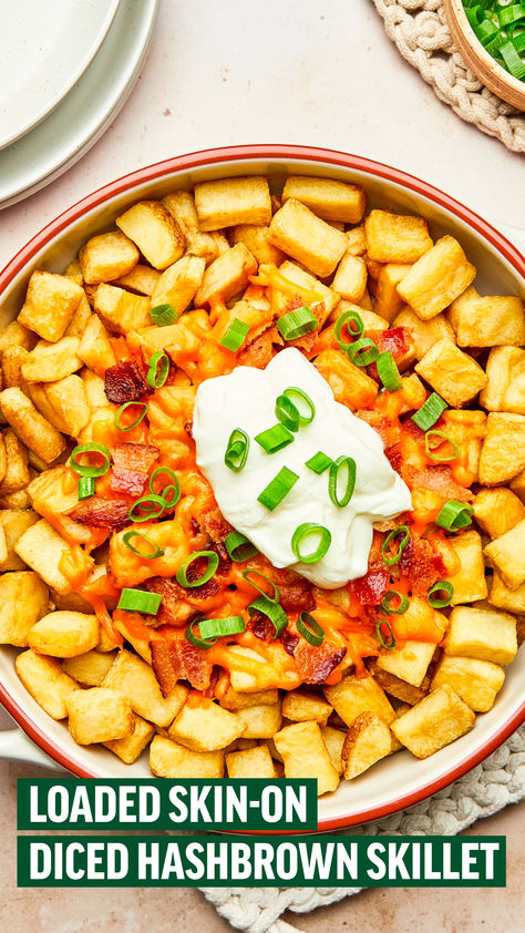 Perfectly shareable and packed with flavour, this Loaded Skin-On Diced Hash Brown Skillet is the perfect quick and easy meal to whip up for a busy weeknight. Diced Hash Browns are topped with melted cheese and crispy bacon and garnished with sour cream and green onion. Easy, delicious and family-friendly, this will be a guaranteed hit at the dinner table. #CavendishFarms #SkilletMeals #LoadedSkinOnDicedHashBrownSkillet #OnePanMeals Hashbrown Skillet, Meal Inspiration, Hash Brown, Hash Browns, Bacon Cheddar, One Pan Meals, Skillet Meals, Green Onion, Crispy Bacon