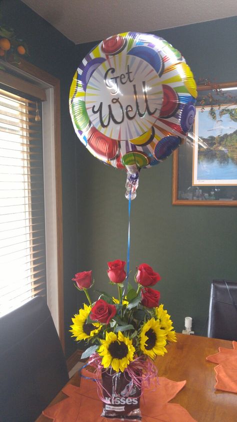 Get well flower arrangment I made for under $15! Roses and sunflowers were purchased at Wal-Mart. The vase, raffi, balloon and kisses were purchased at the dollar tree. Get Well Soon Roses, Get Well Soon Balloons, Get Well Balloons, Roses And Sunflowers, Get Well Soon Flowers, Office Flowers, Get Well Flowers, Wal Mart, Get Well Soon