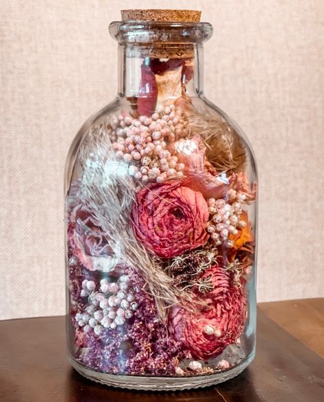 "Turn your beautiful wedding bouquet, or any other meaningful flowers into a forever keepsake that you can cherish for years to come! Preserved flowers are perfectly positioned inside a glass bottle and can be displayed in your home for years to come! Scroll over to see pictures of the dried bouquet before carefully preserving into the glass bottle keepsake.  Bottle measures approximately 8\" tall and 4\" wide. A careful technique is used to put your dried wedding flowers into the bottle. I will Meaningful Flowers, Dried Wedding Flowers, Dried Flowers Crafts, Wedding Bouquet Preservation, Drying Roses, Bouquet Preservation, Flowers In Jars, Dried Bouquet, Diy Roses