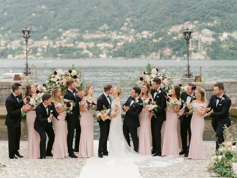 Bridesmaids Behind Groom During Ceremony, Black Suits Pink Dresses Wedding, Wedding Ceremony Bridal Party, Brides Maids And Groomsmen Colour, Bridal Party Black Suits, Dusty Pink Bridesmaid Dresses And Groomsmen, Wedding Ceremony Bridesmaids Groomsmen, Bride Groom Bridesmaids Groomsmen, Bride Groom And Bridesmaids