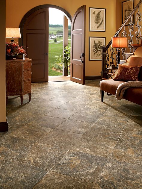 Stone look Luxury Vinyl Tile makes this entryway and foyer look amazing. This 100% waterproof flooding is a low maintenance solution for any area in your house that may see high traffic, moisture and dirt. For more Luxury Vinyl options visit www.RiteRug.com #RiteRugFlooring #luxuryvinyltileflooring #LVT #stonelookvinyl #entrywayideas #foyer Entryway Tile, Luxury Vinyl Tile Flooring, Luxury Tile, Lvt Flooring, Natural Flooring, Vinyl Tile Flooring, Linoleum Flooring, Luxury Vinyl Plank Flooring, Best Flooring