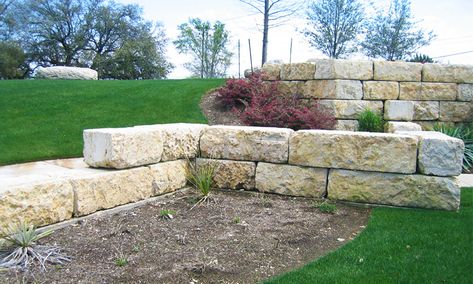 Limestone Blocks Landscaping, Limestone Block Retaining Wall, Limestone Retaining Wall Ideas, Limestone Retaining Wall, Block Retaining Wall, Boulder Wall, Cabin Landscape, Cheap Landscaping, Backyard Retaining Walls