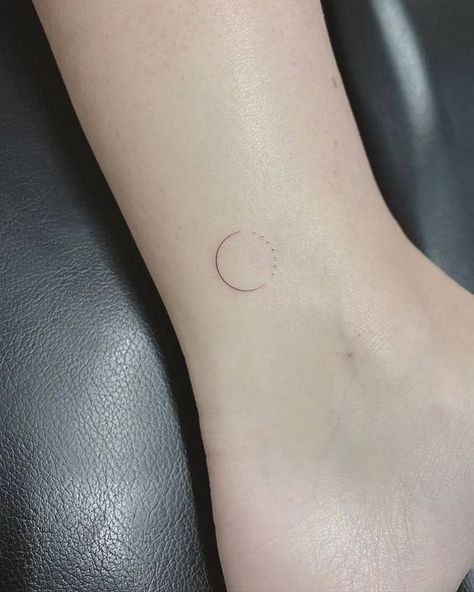 Small and minimalist sun and moon ankle tattoo Circle Tattoo Minimalist, Circle Ankle Tattoo, Single Needle Moon Tattoo, Minimalist Circle Tattoo, Circle Line Tattoo, Simple Circle Tattoo, Moon Tattoo Designs Minimalist, One Needle Tattoos, Minimalist Foot Tattoo