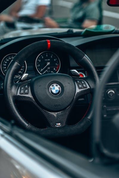 Person Holding Bmw Steering Wheel · Free Stock Photo Bmw Steering Wheel, Bmw Photography, Premium Interior Design, Luxury Bmw, Bmw Interior, Today Images, M3 Bmw, Car Photo, Bmw M4