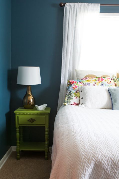 Bright painted night stand and deep teal walls in this simple guest room Simple Guest Room, Painted Night Stands, Teal Walls, Spare Bedroom, Night Stand, Deep Teal, House Tour, Guest Bedrooms, Blue Walls