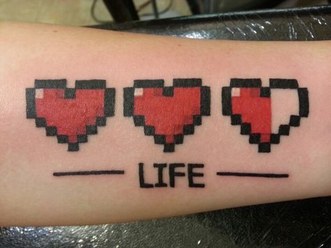 Zelda life Nintendo tattoo by Ryan Sketch Martin Quote Tattoos Meaningful, Vibrations Tattoo, Pixel Heart Tattoo, Undertale Tattoo, Minecraft Tattoo, Arm Quote Tattoos, Birthdate Tattoo, Nintendo Tattoo, Girl Shoulder Tattoos