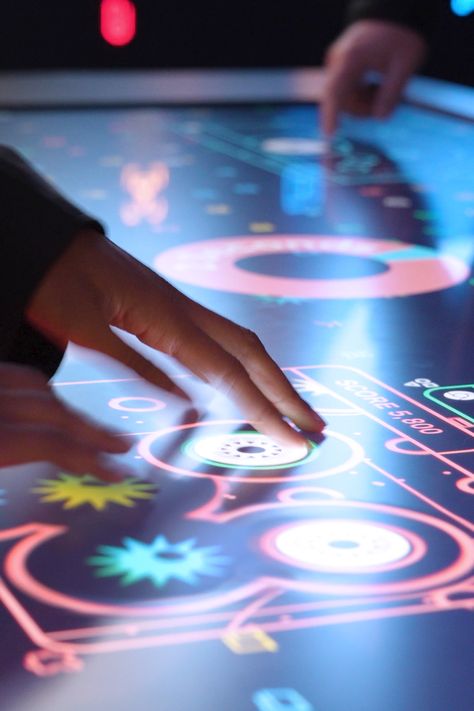 A close up of Bloomberg Technology Summit attendees hands, playing the colorful Data Defense Game on a touchtable. The display shows stylized Google Chrome windows with files being scanned for threats. Immersive Installation, Interactive Art Installation, Heart Projects, Interactive Installation, Interactive Art, Red Paper, Paper Heart, Data Protection, New Game