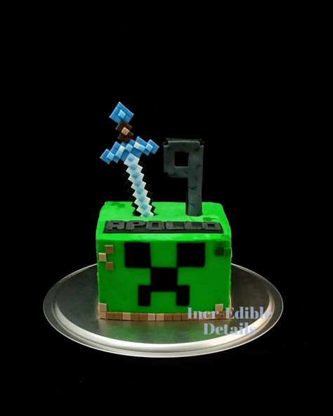 Minecraft creeper style birthday cake with fondant sword topper and details Minecraft Creeper Cake Ideas, Minecraft Cake Without Fondant, Minecraft Creeper Birthday Cake, Creeper Minecraft Cake, Minecraft Enderman Cake, Creeper Birthday Cake, Creeper Cake Minecraft, Minecraft Square Cake, Minecraft Dungeons Cake