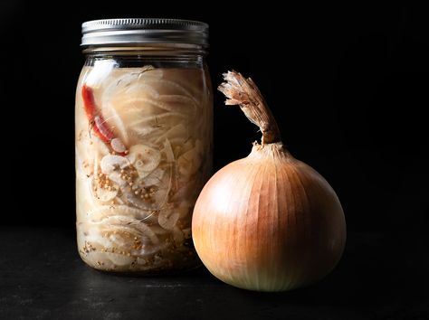 Pickled Onions & Garlic are quick to make and great for dressings, sandwiches, and salads. Pickled Yellow Onions Recipe, Pickled Yellow Onions, Santa Monica Farmers Market, Cucumber Salads, Yellow Mustard Seeds, Champagne Vinegar, Pickled Garlic, Refrigerator Pickles, Vegan Side Dishes