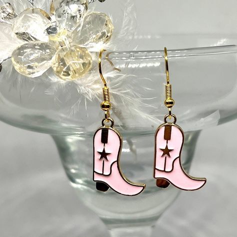 Western Charm: Dainty Handmade Pink Cowboy Boot Earrings - Cowgirl Jewelry #CowgirlEarrings #CowboyRodeoJewelry #CuteTrendyEarrings #GoldSilverEarrings #CowgirlStyle #GiftsForHer #HandmadeDainty #SpecialRodeoGirl #WesternStyle #EarringsEveryday Pink Cowboy Boot, Cowboy Boot Earrings, Boot Earrings, Rodeo Jewelry, Pink Cowboy Boots, Rodeo Girls, Pink Cowboy, Cowgirl Jewelry, Trendy Earrings