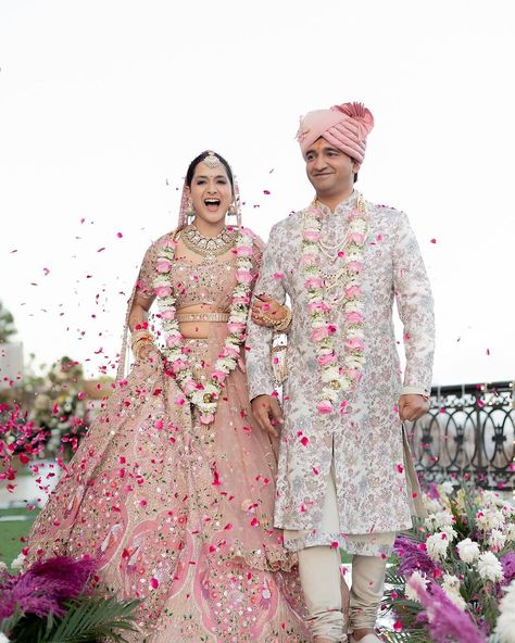 Marriages are settled in heaven but celebrated on earth. The unity of two souls written right from birth... ♥️😊 Couple : @_arushisharma and @vaibhav_vishant Follow 👉 @TheFabApp for more updates.. ✔️ . . . . . #indianbride #indianwedding #intimatewedding #weddingday #weddinginspiration #bollywoodstyle #lovestory #loveisintheair #makeupartist #makeuplover #outfitinspo #outfitoftheday #outfitinspiration #ootdfashion #ootdstyle #beautifulbride #bridaljewellery #pinklehenga #mahiyejinnasohna #d... Bridal And Groom Wedding Dress, Bride And Groom Dress, Engagement Couple Dress, Pink Bridal Lehenga, Latest Bridal Lehenga Designs, Bride Groom Poses, Wedding Highlights Video, Groom Dress Men, Pink And White Weddings