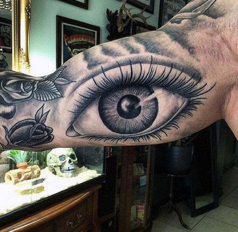 Eye And Rose Tattoo Male Inner Biceps Tato Mata, Ojo Tattoo, Tattoo Bicep, Realistic Eye Tattoo, Bicep Tattoos, Herren Hand Tattoos, Bicep Tattoo Men, Tato Dada, Inner Bicep Tattoo