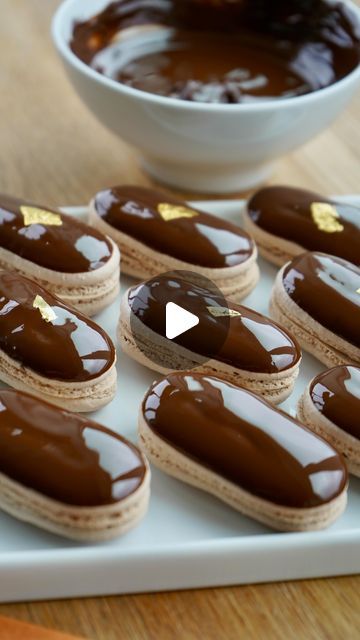 Maddie Brehm on Instagram: "Chocolate Eclair Macarons   With a pastry cream style chocolate ganache, cocoa macaron shell and dark chocolate coating these macarons are not ones you want to miss out on!   You can find the recipe AND tutorial video in my newest Time for Dessert ebook! 👩🏻‍🍳   #macarons #frenchmacarons #pastryvideos" Macaroon Recipes Videos, Eclair Recipe Videos, Choc Ganache, Eclair Recipe, French Macaroons, Chocolate Eclair, Macaroon Recipes, Pastry Cream, Chocolate Coating