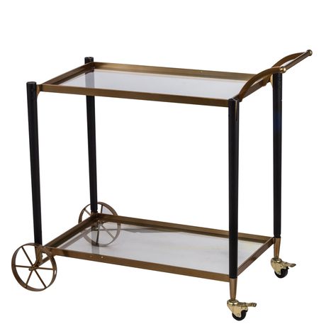 The Classic Chic Gold Serving cart features two tiers of safety-tempered glass, ideal for tea parties or even just serving your favorite beverages in an elegant and easy manner. The gold-polish railing is elegant and timeless, and also helps to prevent slipping. In subtle colors and rich neutral tones, this cart will add the perfect touch to your dining room decor. - Gold 36-Inch Serving Cart - Unique accent adds a flair of classic chic style to your home - Metal cart with glass and wood accents Gold Cart, Metal Cart, Classic Chic Style, Gold Bar Cart, Serving Bar, Classic Bar, A&b Home, Serving Cart, Fir Wood