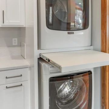 Pull Out Table - Laundry Room - Other - by Thayer Construction LLC | Houzz Stackable Washer Dryer With Folding Table, Stackable Washer Dryer Laundry Room With Folding Table, Pull Out Table Laundry Room, Stand Up Washer And Dryer Room Ideas, Laundry Room Hidden Folding Table, Pull Out Laundry Table, Diy Stackable Washer And Dryer Stand, Stacked Washer Dryer Pull Out Shelf, Hidden Folding Table Laundry Room