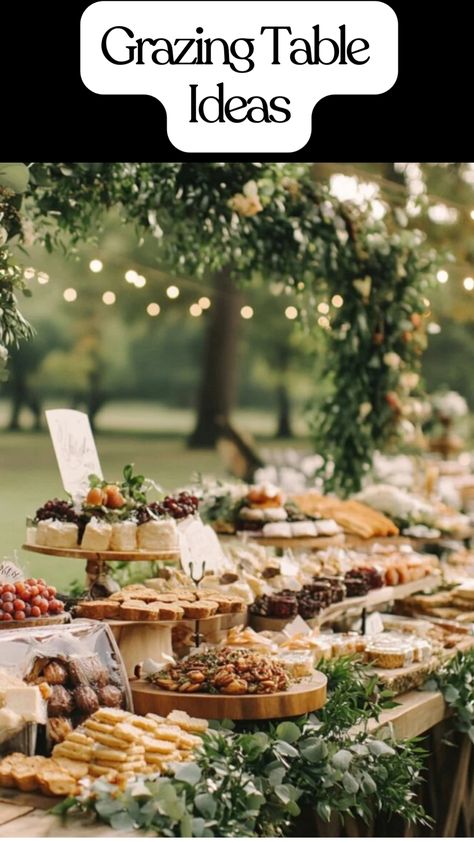 A beautifully arranged grazing table featuring colorful fruits, cheeses, and snacks for a wedding reception or party. Buffet Table Food Display, How To Keep Grazing Table Cold, Bbq Table Decorations Backyard Parties, White Grazing Table, Christmas Grazing Tables, Wedding Taco Bar Setup Ideas, Grazing Tables Ideas, Wedding Finger Foods Receptions, Buffet Table Ideas Decor Party Planning