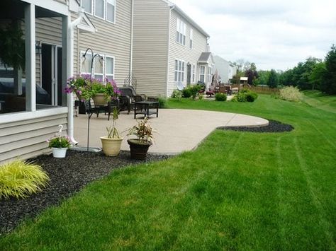 Exposed Aggregate Patios – Pros & Cons, Ideas & Pictures - Concrete Network Exposed Aggregate Patio, Aggregate Patio, Exposed Aggregate Concrete, Decorative Aggregates, Aggregate Concrete, Exposed Aggregate, Decorative Stones, Concrete Contractor, Fire Pit Area